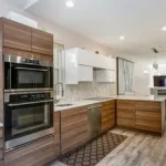 Modern kitchen with wood cabinets and island